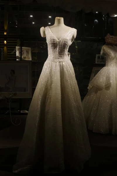 wedding dress on mannequin in the room