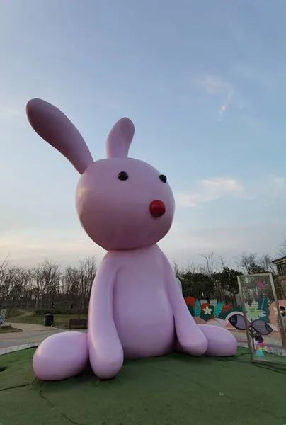 a toy rabbit in the park