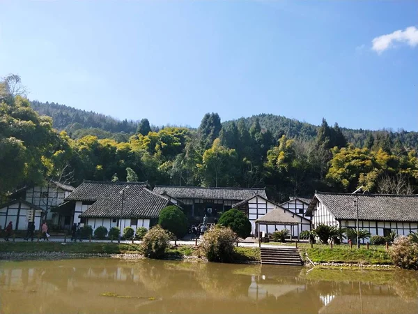 beautiful landscape with a river and a house