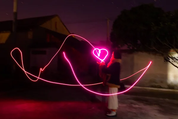 love heart with neon light bulb