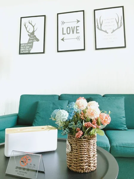 beautiful living room interior with flowers and plants