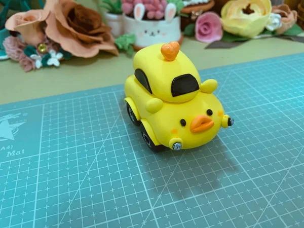 toy car with a yellow background