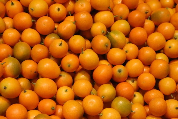 fresh ripe oranges on a white background