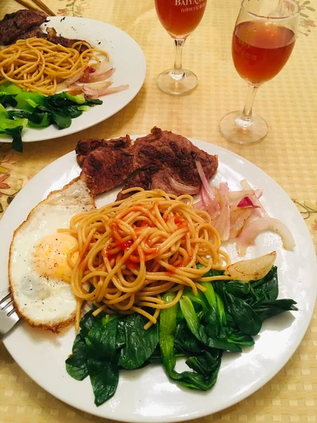 delicious spaghetti with meat and vegetables