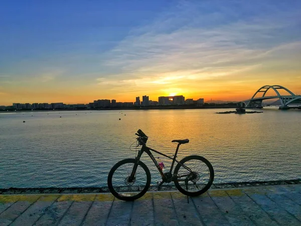 view of the city of the sea in the sunset