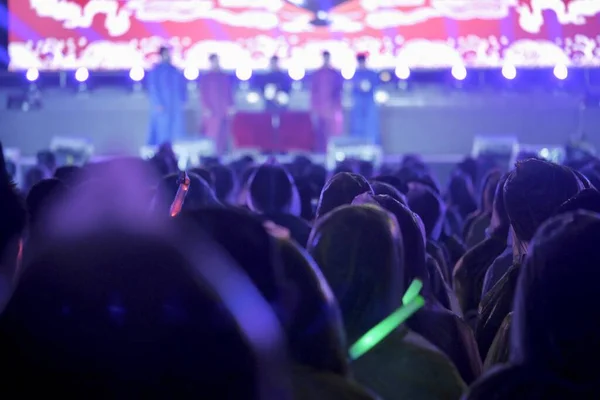 people at the concert. audience at the stage.