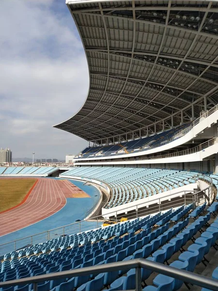 empty stadium with seats and boxes