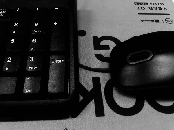 computer mouse and keyboard with a key