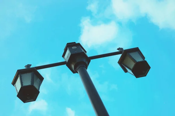 street lamp on a blue sky background