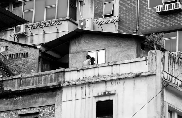 black and white photo of a building in the city of bilbao