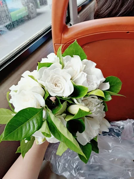 beautiful wedding bouquet of roses in the car