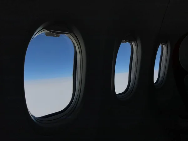 airplane window in the sky