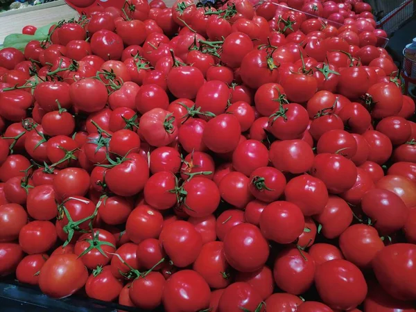 red tomatoes in a market