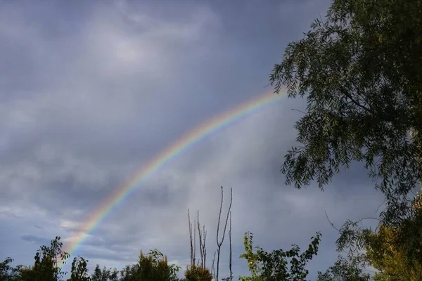 rainbow sky with clouds and blue skies