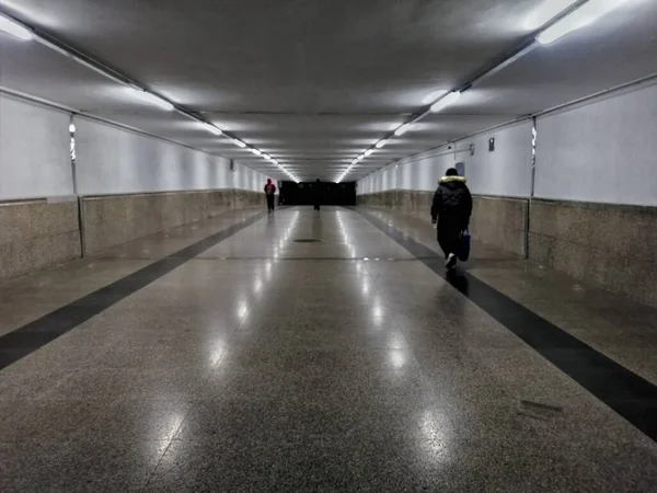 underground tunnel with people