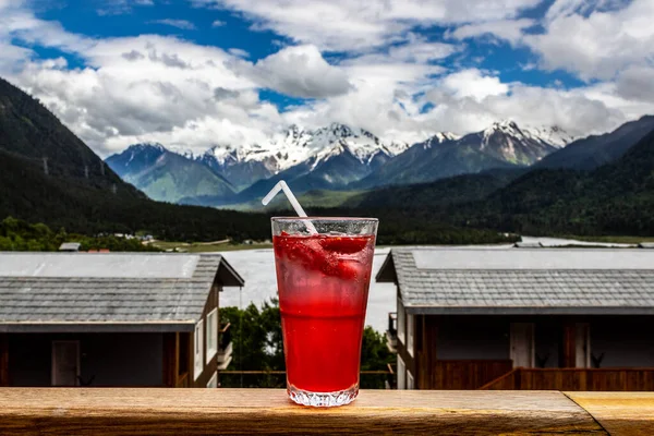 red wine on the background of the mountains