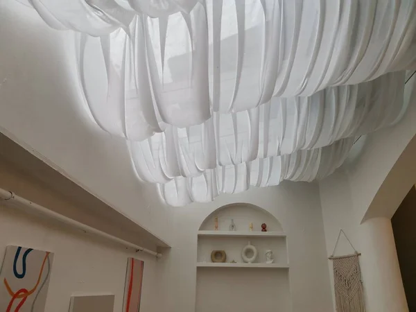 white ceiling with a lantern