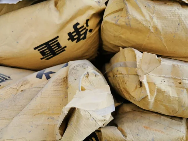 close up of a pile of paper bags