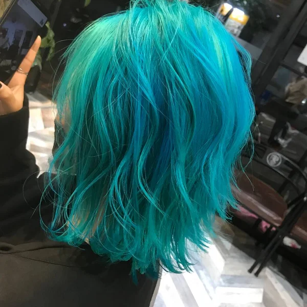 woman with hair dryer in the store