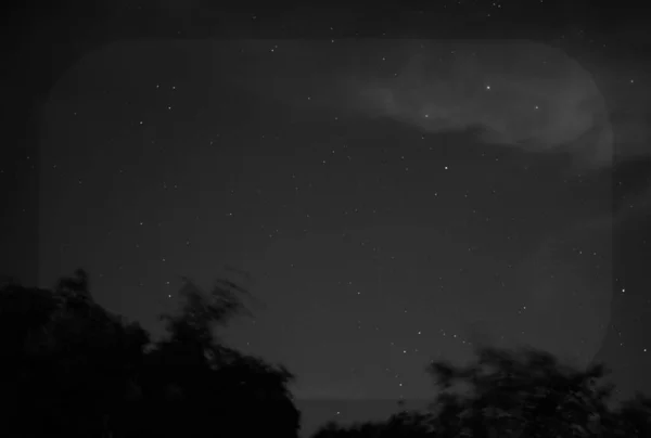 night sky with stars and snow