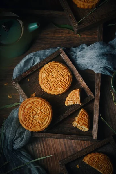 chinese moon cake with nuts and tea