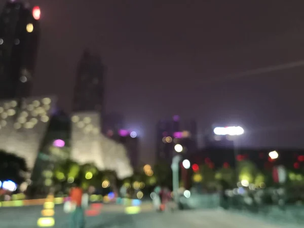 blurred background of city lights