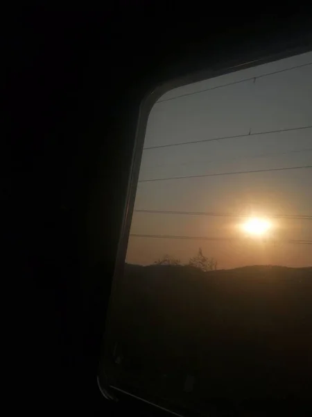 view of the window of the sunset