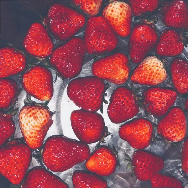 fresh strawberries on a black background