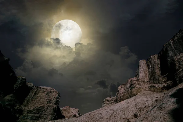 beautiful night landscape with moon and clouds