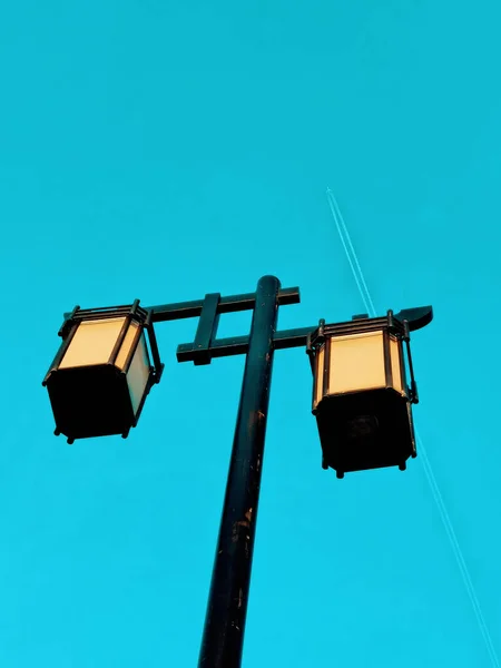 electric pole on the background of the blue sky