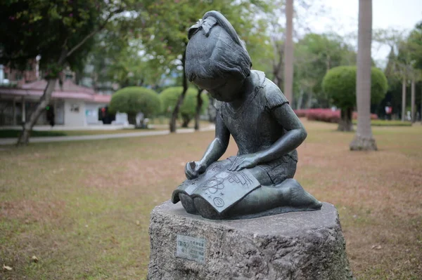 statue of a woman in the park