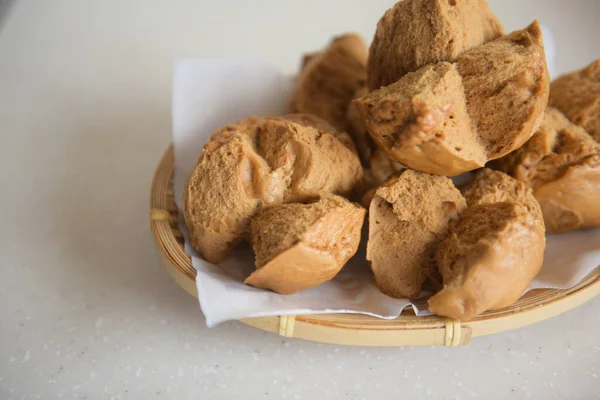 homemade cookies with sesame seeds and cheese on a white background