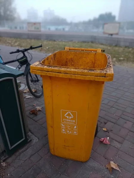old trash bin in the city