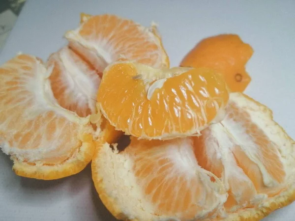 fresh orange fruit on white background