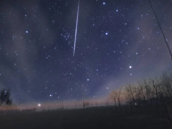 night sky with stars and snow