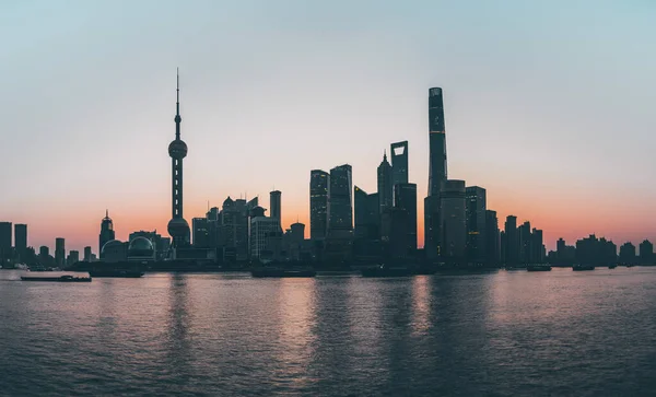 shanghai skyline at sunset, china