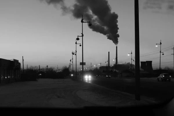 black and white smoke of the factory