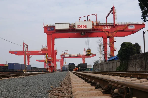 red and white cargo ship