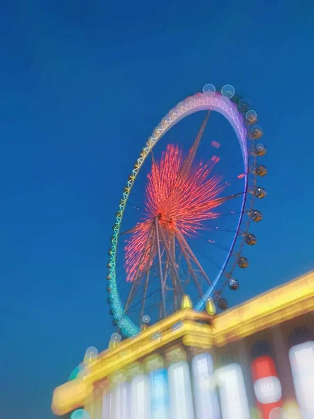 ferris wheel in amusement park, london, usa