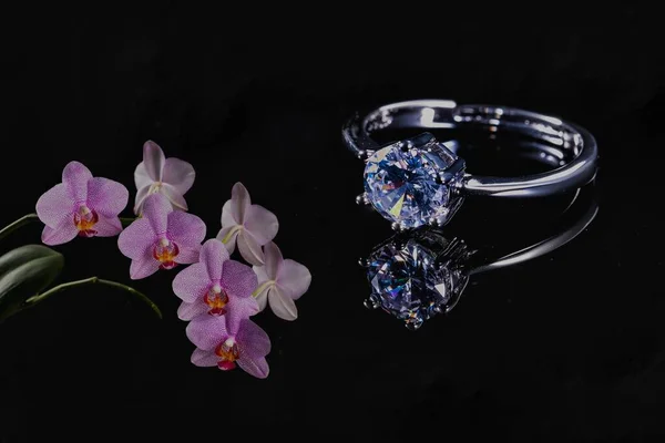beautiful luxury jewelry with diamonds on black background