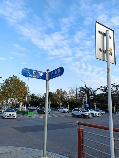 street sign with a lot of people signs