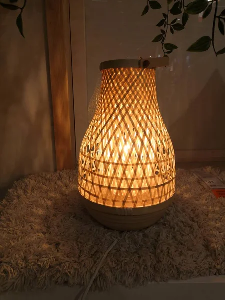 beautiful decorative lamp on wooden table