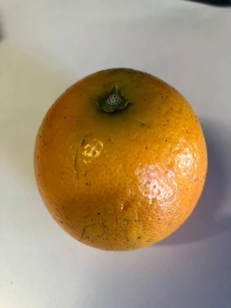 fresh orange fruit on white background