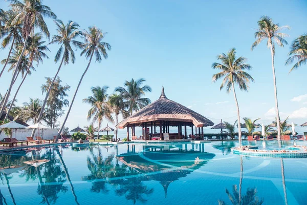beautiful luxury swimming pool in hotel resort, travel concept