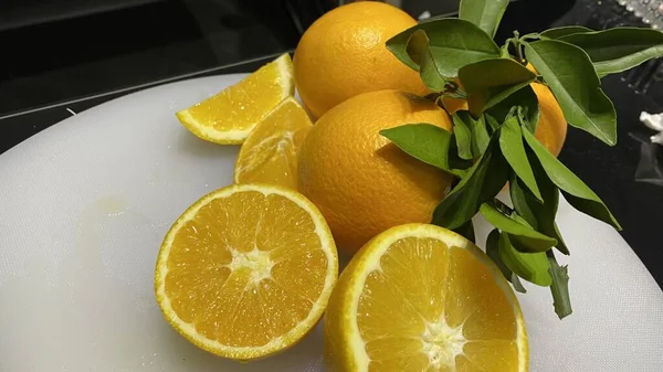 fresh lemons and lemon on a black background