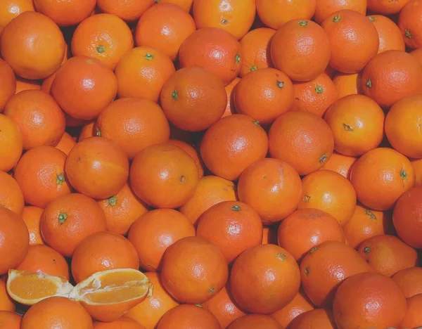 fresh ripe oranges on a white background