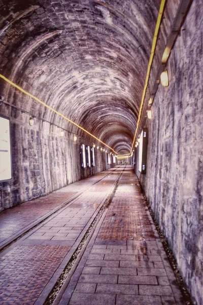 underground tunnel with railway station