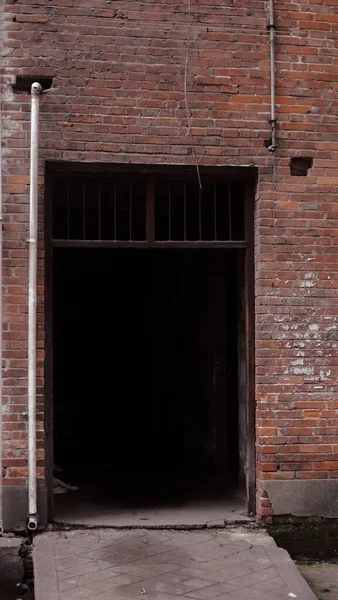 old brick wall with a window