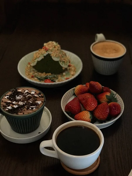 chocolate cake with coffee and berries