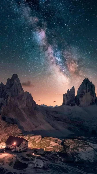 beautiful landscape with mountains and stars